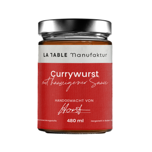 Currywurst mit hauseigener Sauce